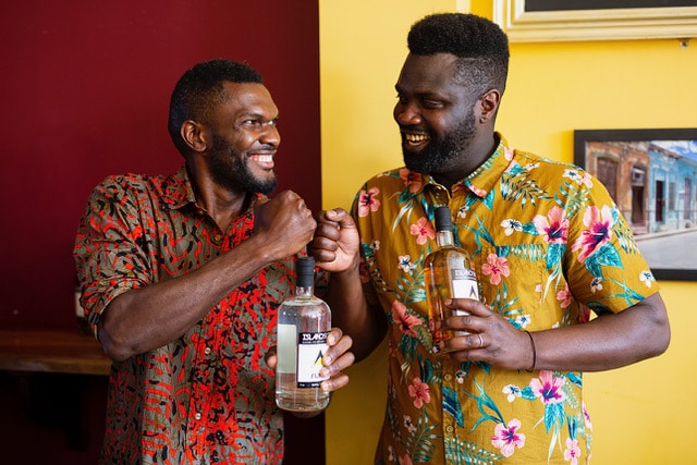 birmingham-rum-festival-two-men-with-tropical-shirts-with-rum-bottles