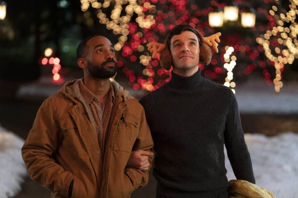 Single All The Way (L-R). Philemon Chambers as Nick, Michael Urie as Peter, in Single All The Way. Cr. Philippe Bosse/Netflix © 2021