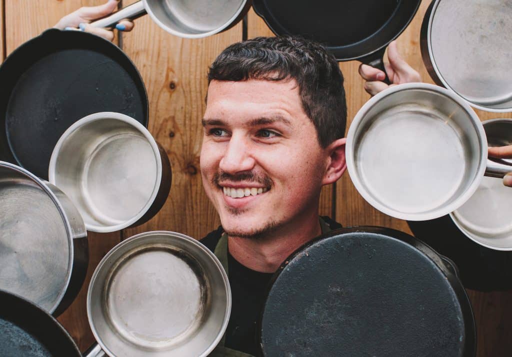 Stuart Deeley surrounded by pots and pans at Hampton Manor