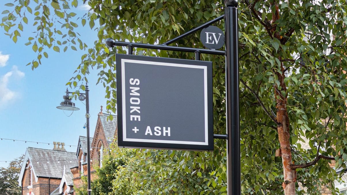 A sign that read Smoke + Ash