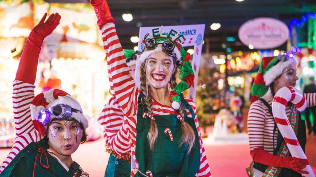 Two women dress up as Christmas elves at Winter Funland