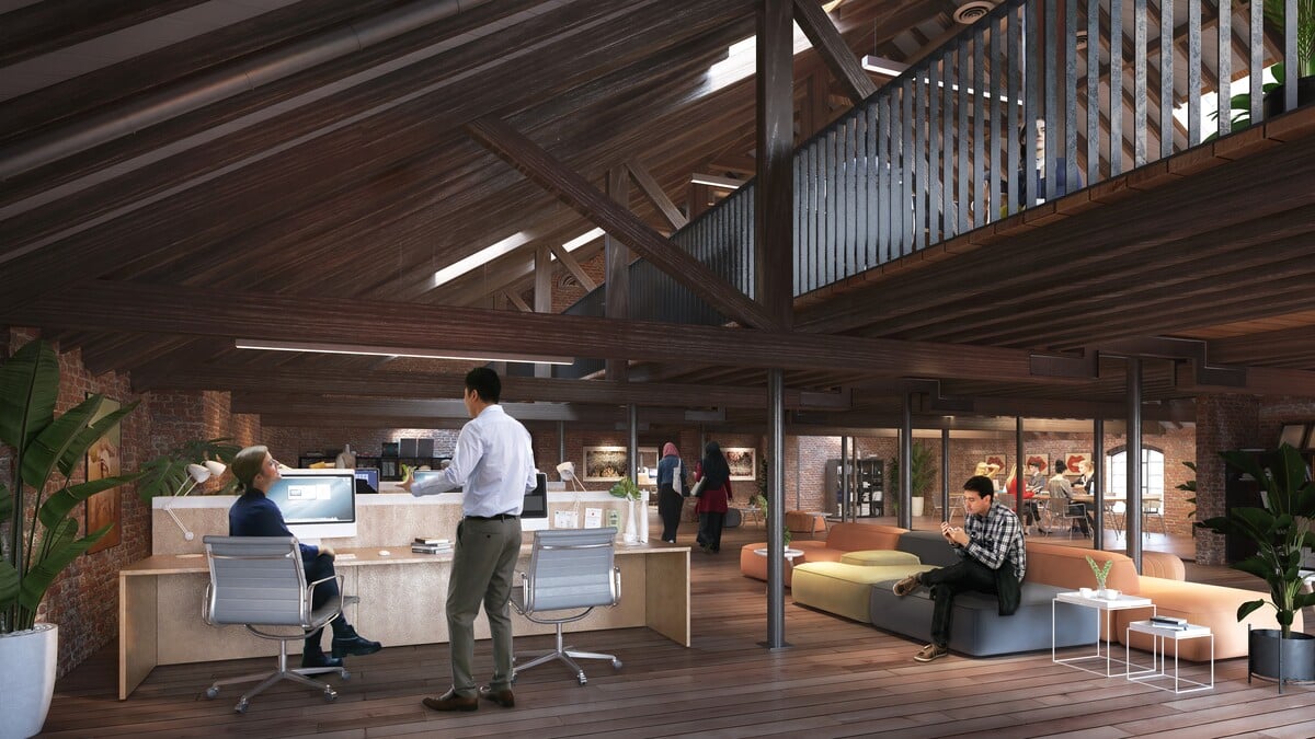 Designs for inside The Bond, with people working at desks