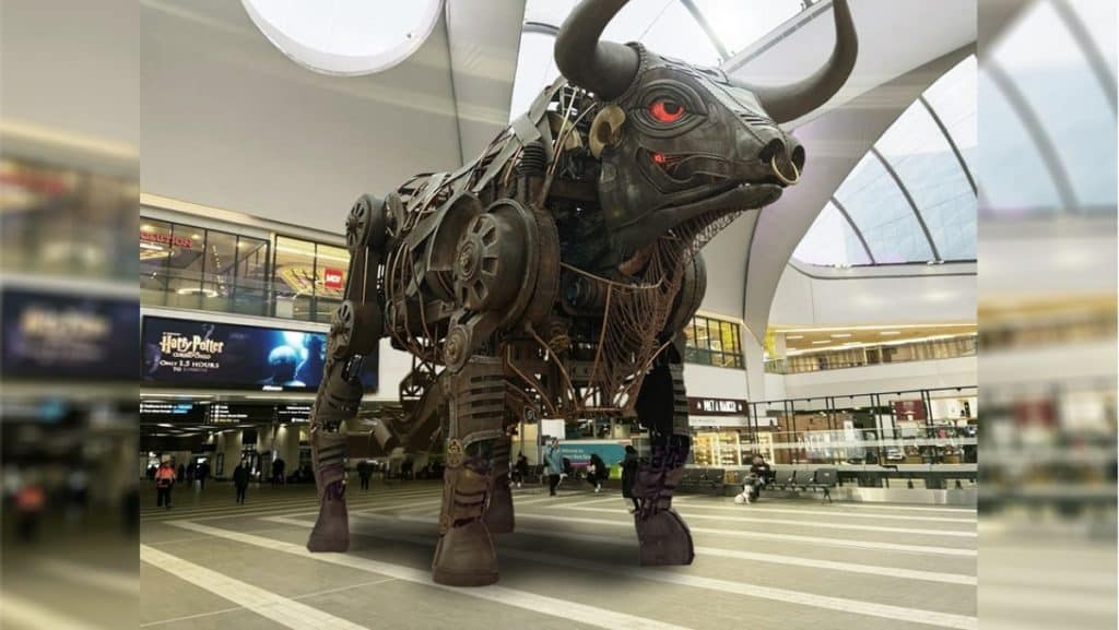 Commonwealth bull sitting inside of New Street Station