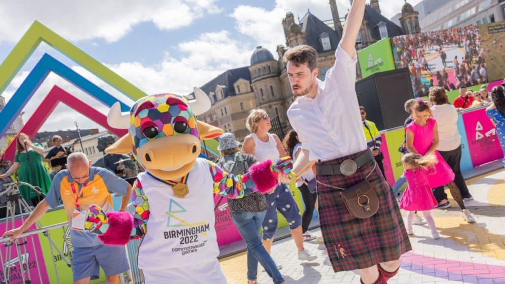 Perry the Mascot dancing with a man in a kilt to promote Birmingham festival 23