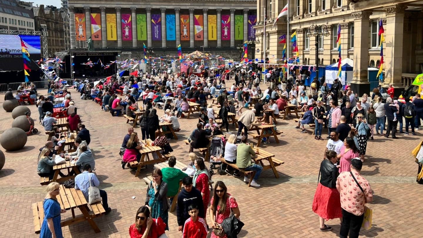 A crowd of people on Centenary Square in Birmingham 