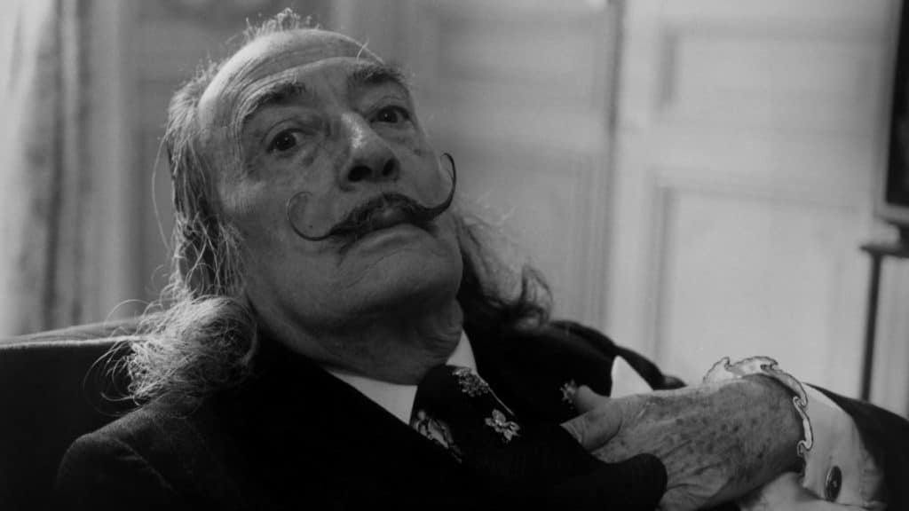 Salvador Dali at the Meurice hotel in Paris on a Harley Davidson in 1973