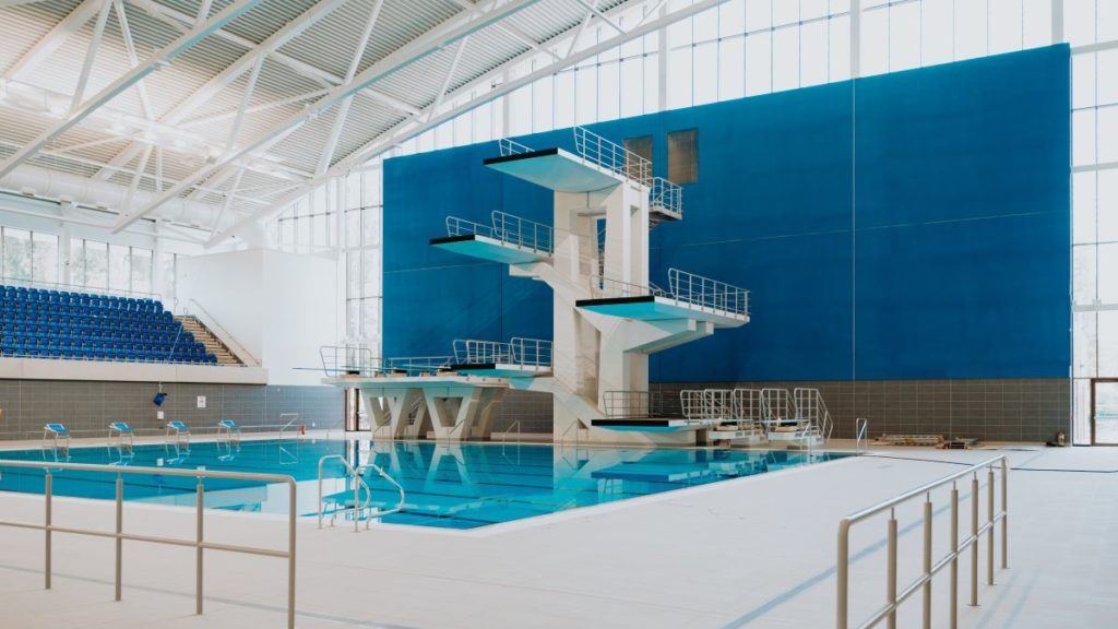 A diving platform over a swimming pool at Sandwell Aquatics Centre