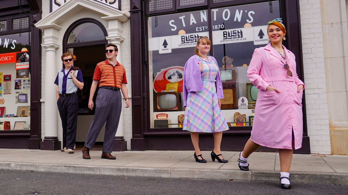 People dressed up for the 1950s-themed shop, leaving a shop at the Black Country Living Museum 