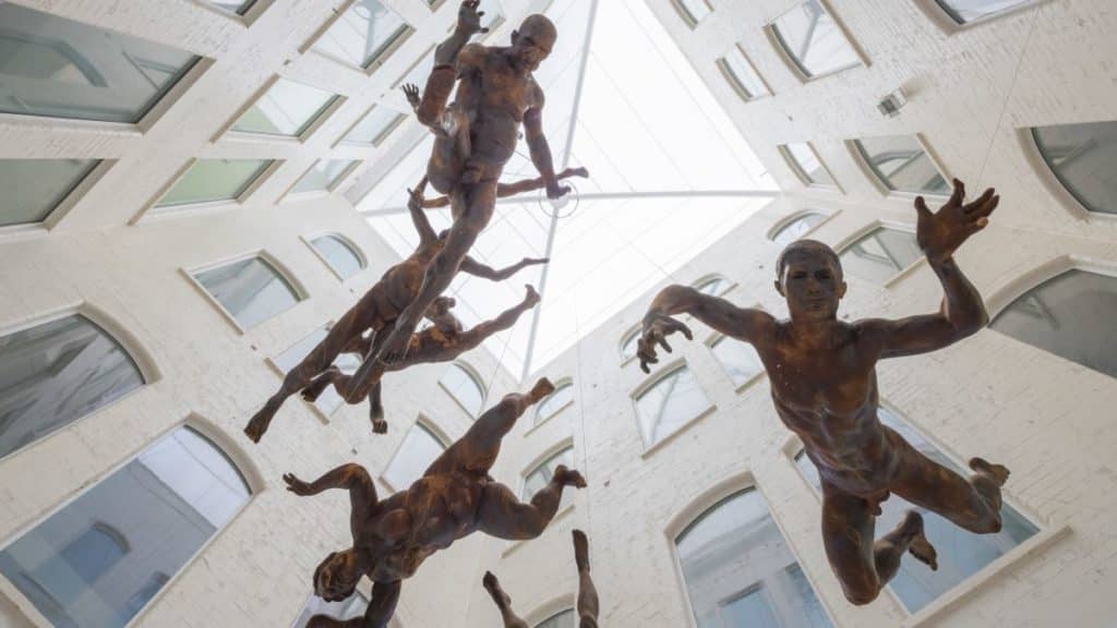 Artwork of people falling in the Zelling building