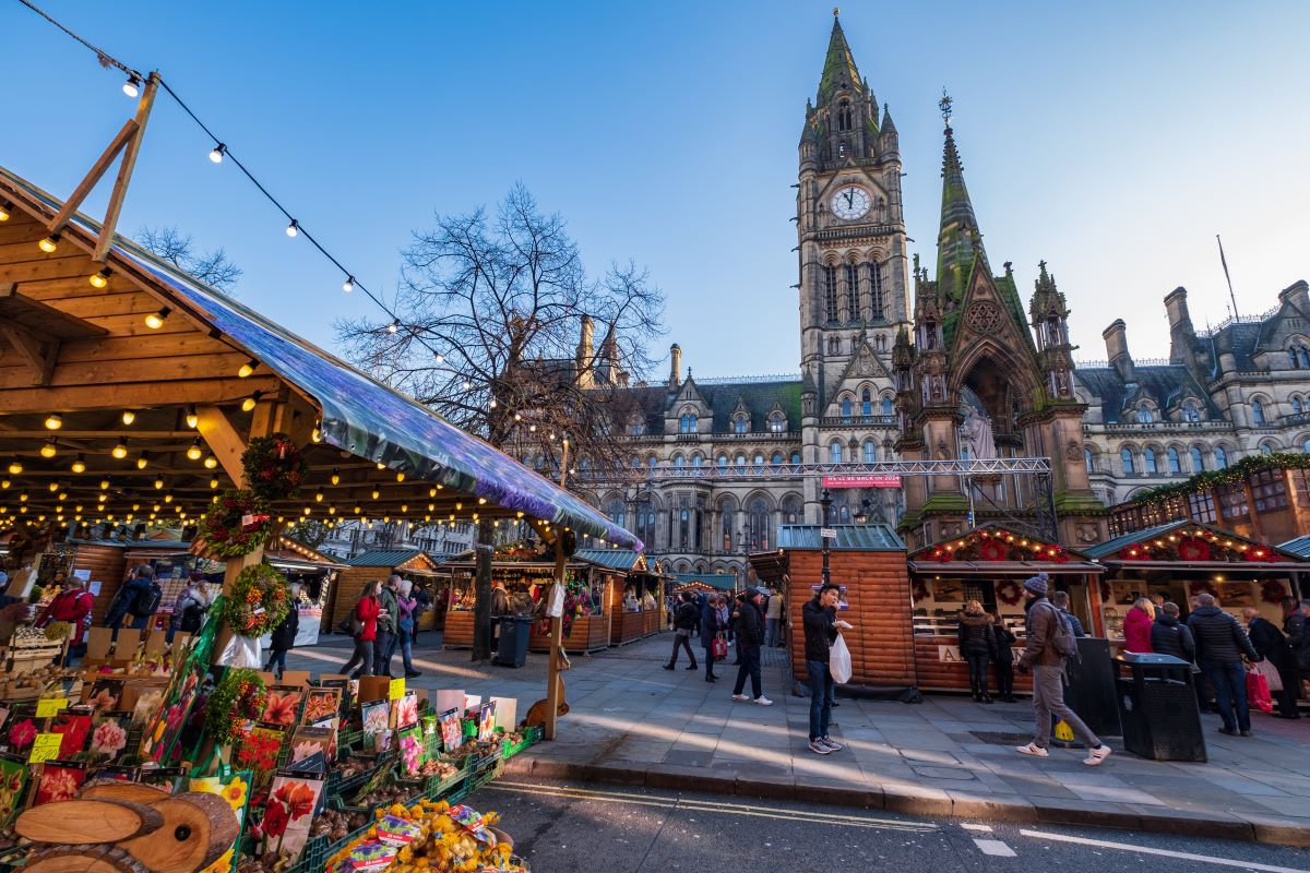Manchester, United Kingdom - November 29, 2019: Christmas Markets in Albert Square near the Town Hall of Manchester in the nortwest of England